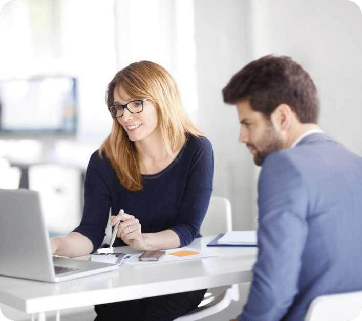 Man and woman on a laptop